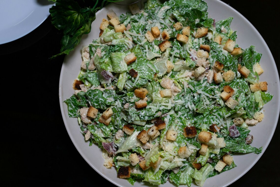 Caesar salad with croutons and dressing